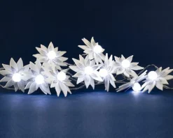 Guirlande lumineuse avec poinsettias blancs à 10 LED blanc froid et câble argent sur piles - 1,80 m