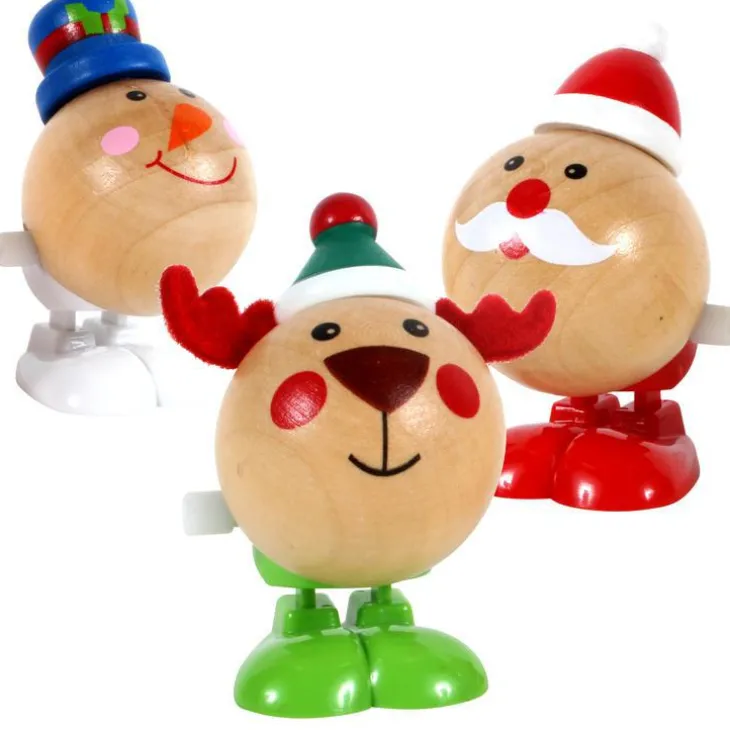 Jouet en bois avec remontoir 3 modèles assortis Ø 4 x H 6,5 cm