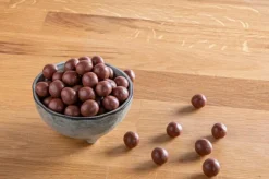 Noisettes enrobées de chocolat au lait - Prix au kilo