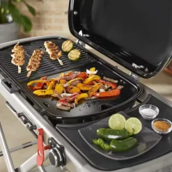 Plancha en fonte d’acier émaillée noire pour barbecue Weber Traveler - 32 x 34,5 cm