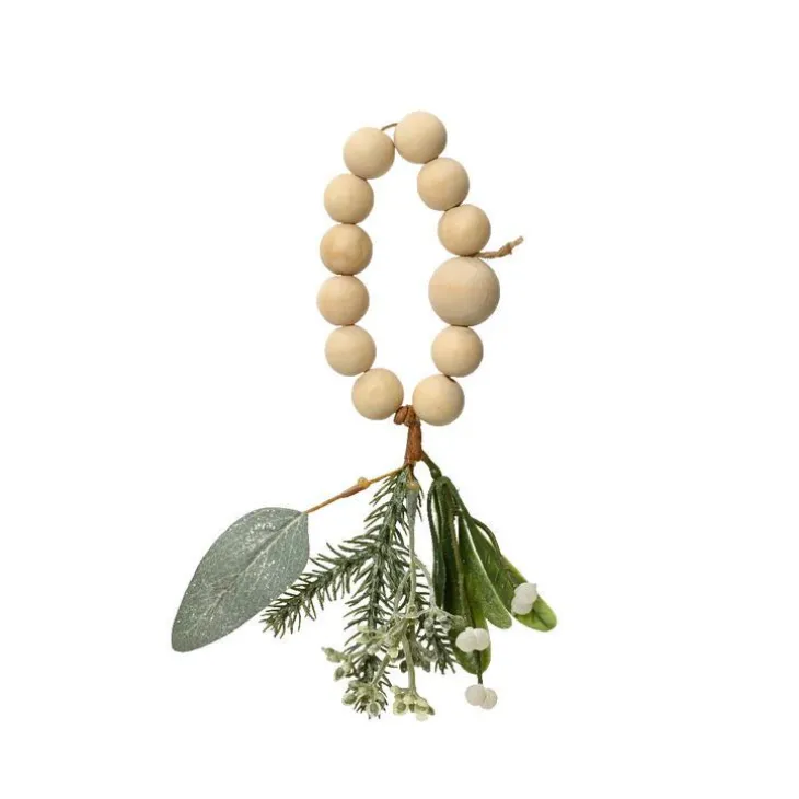 Rond de serviette coloris vert avec boules en bois, pommes de pin, eucalyptus et paillettes Modern – 6 x 9 x 9 cm