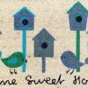 Tapi brosse coco beige imprimé maisons à oiseaux bleu Sweetsol - 75 x 45 cm